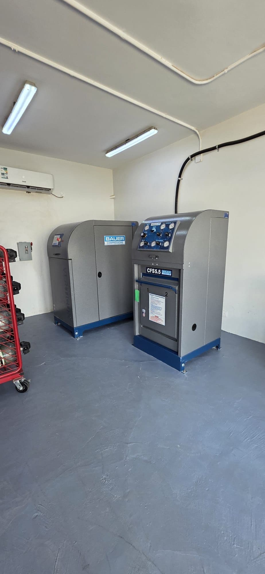 The breathing-air compressor installed in the plant room.